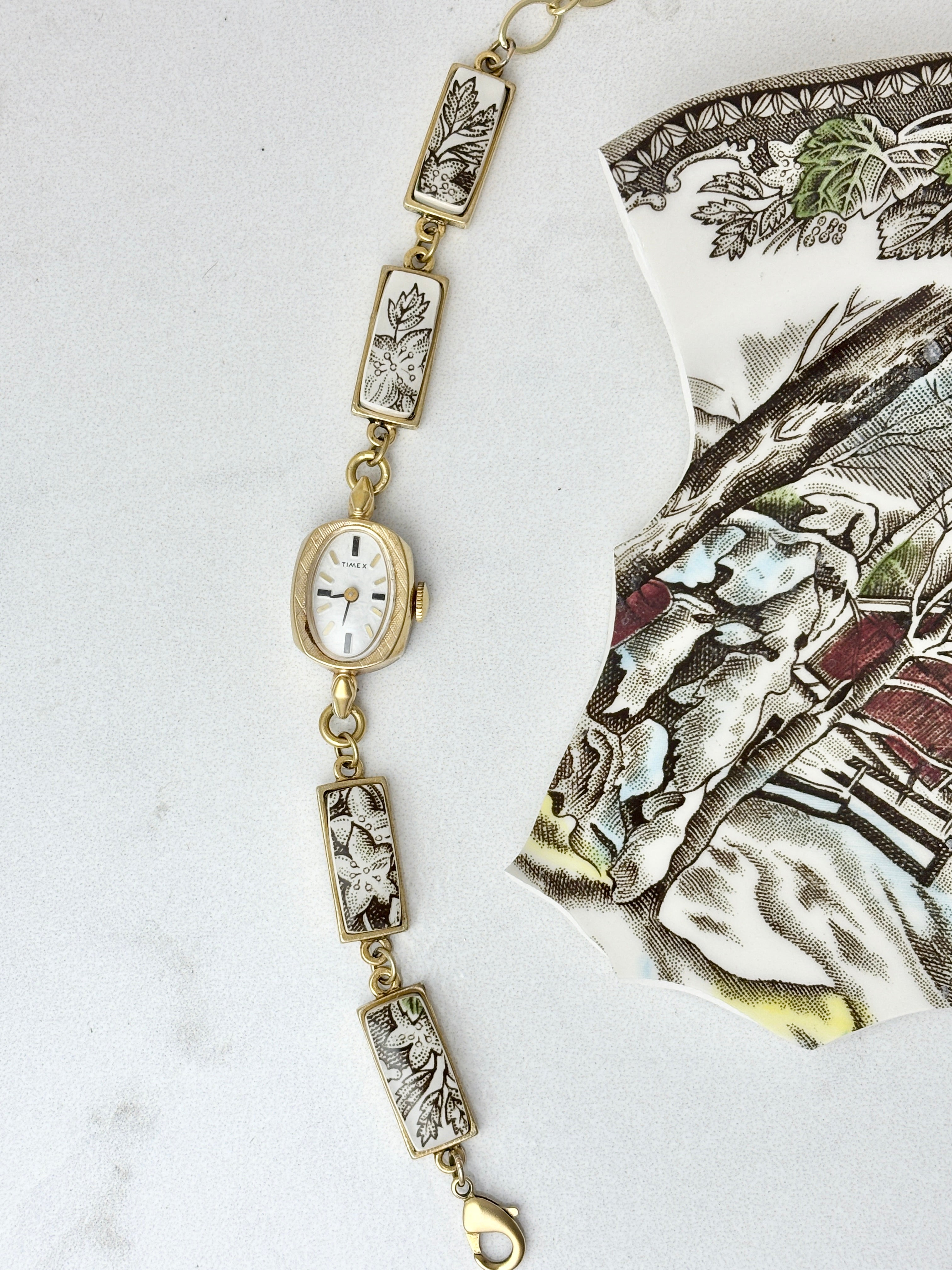 Vintage Timex watch with The Friendly Village