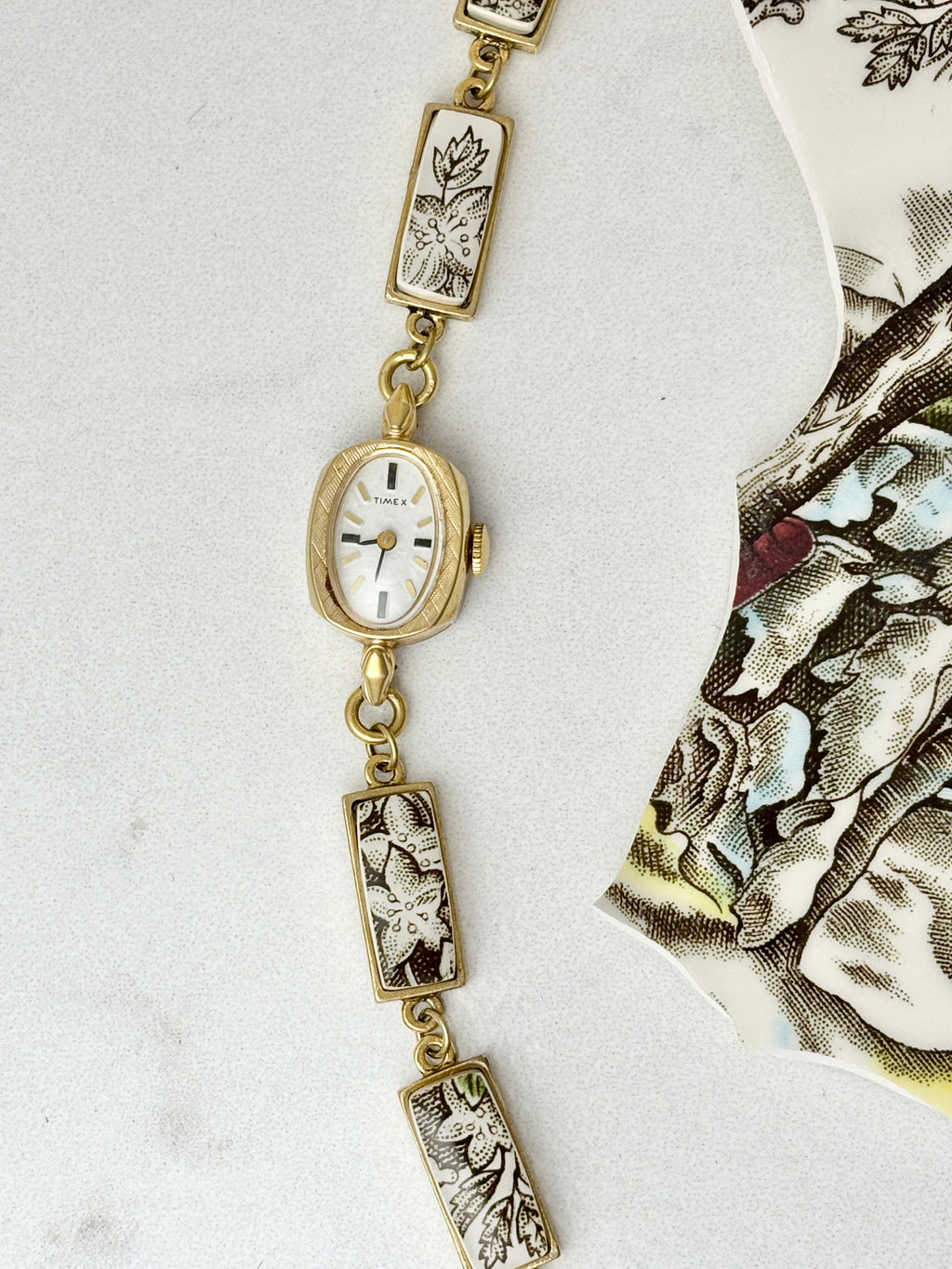 Vintage Timex watch with The Friendly Village