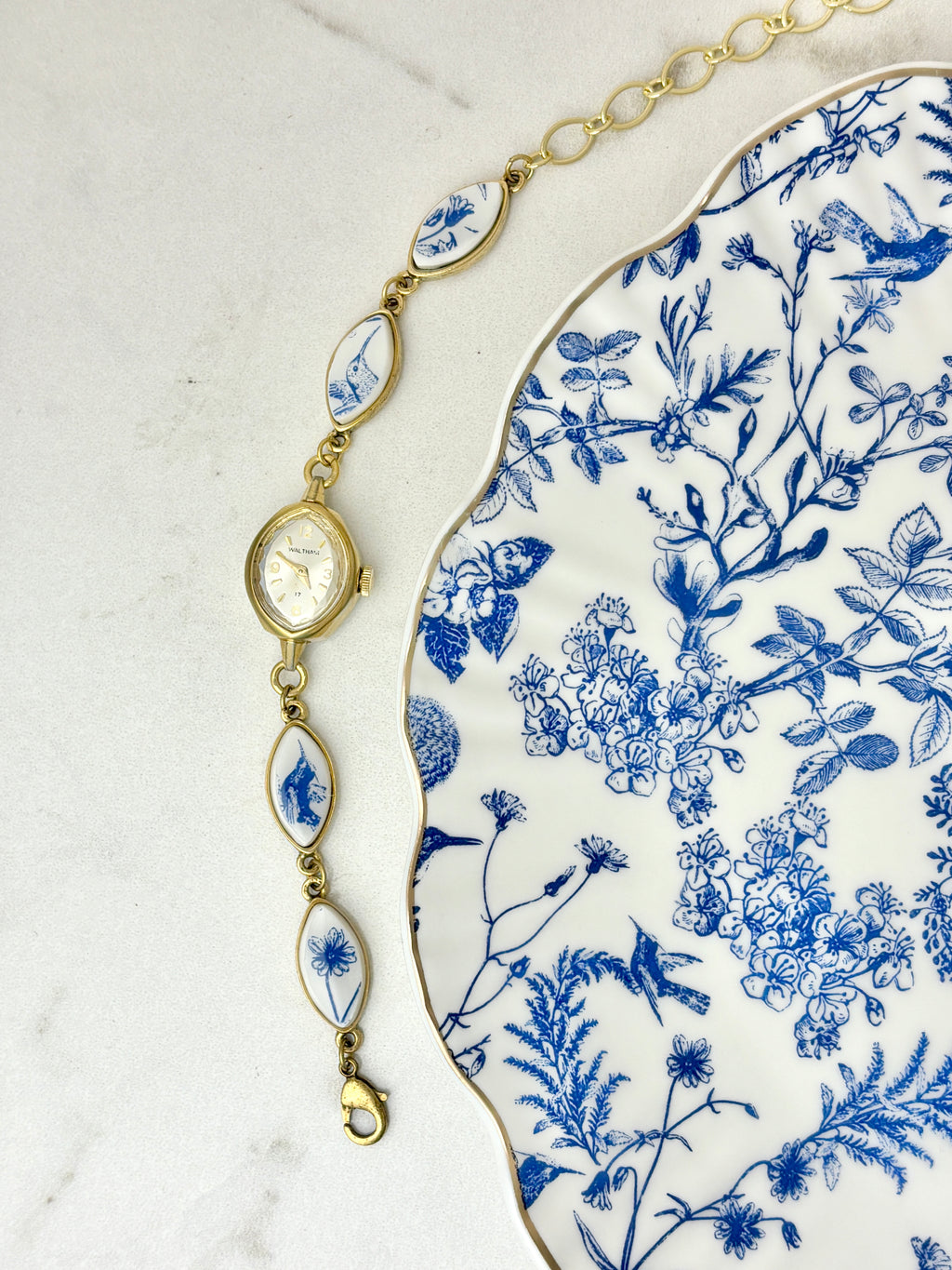 Antique Waltham manual watch with blue hummingbirds