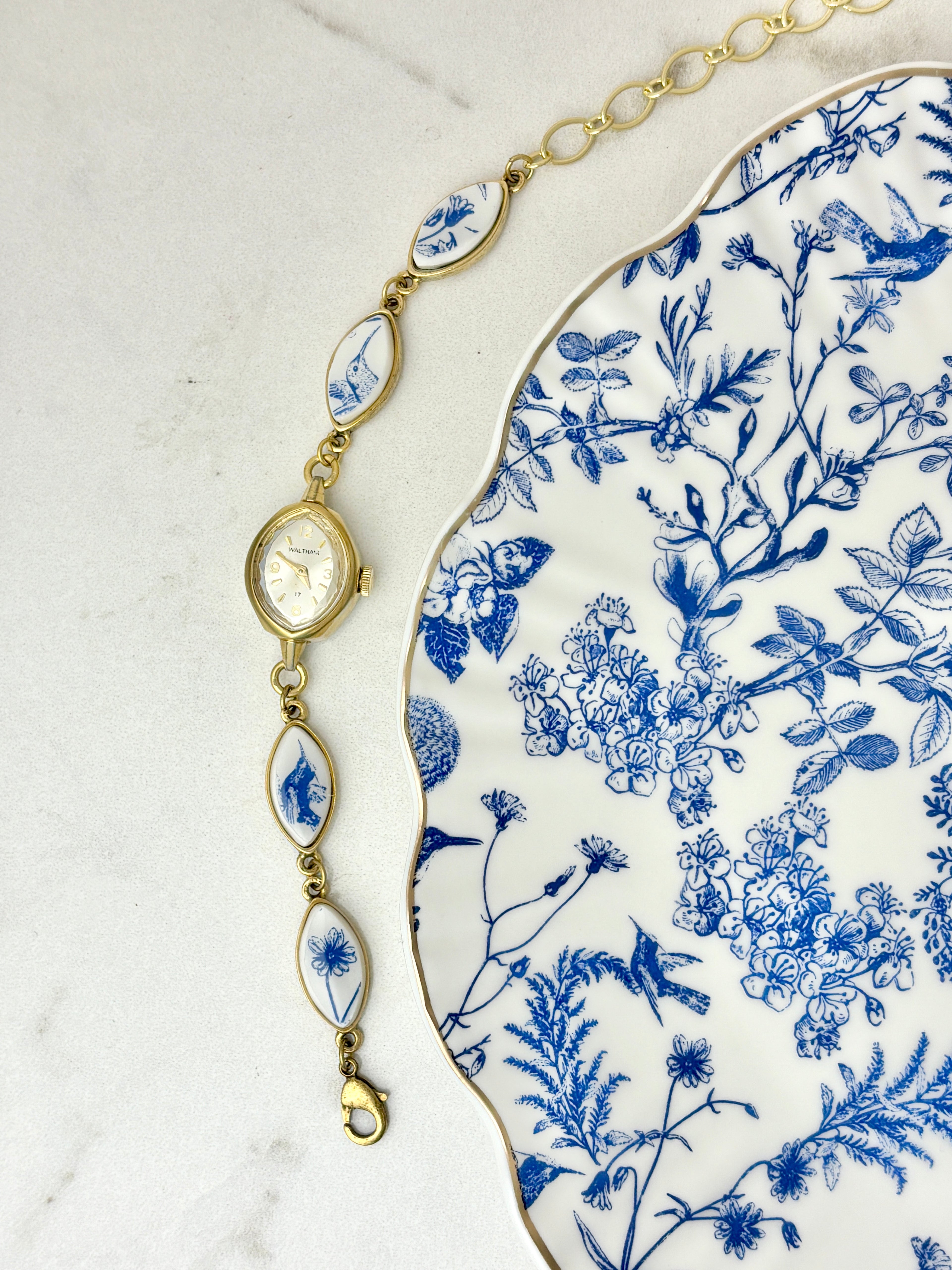 Antique Waltham manual watch with blue hummingbirds