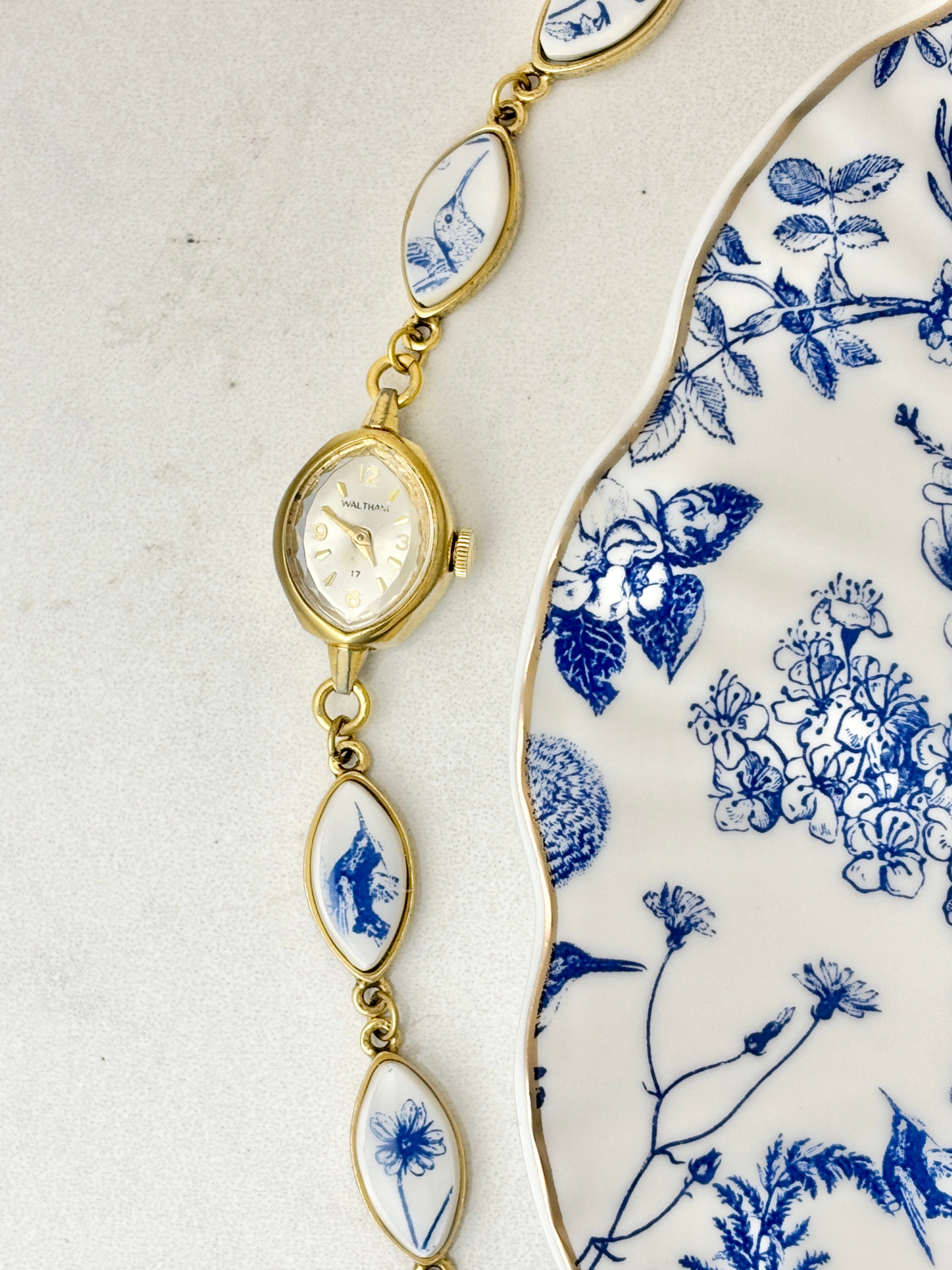 Antique Waltham manual watch with blue hummingbirds
