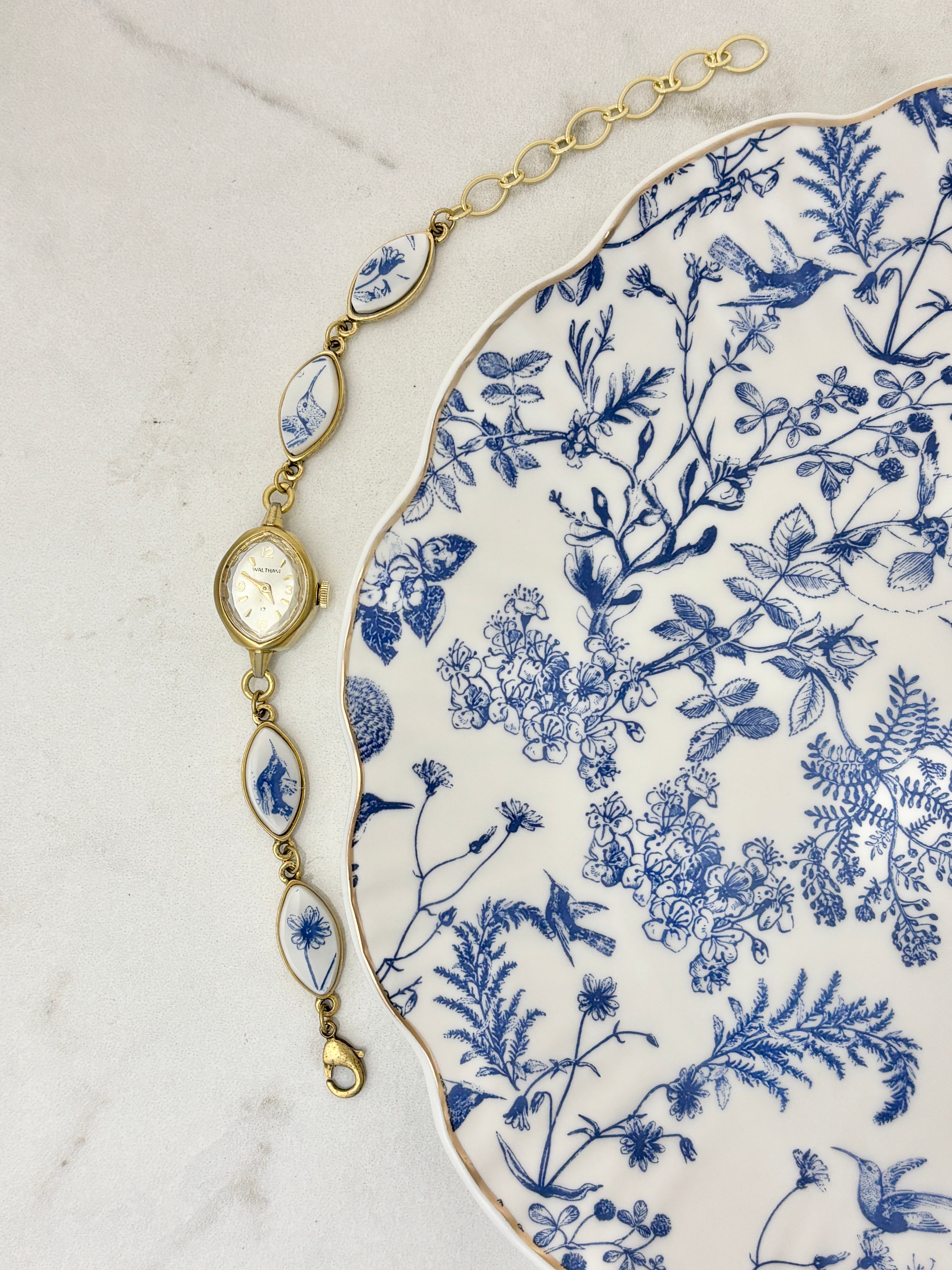 Antique Waltham manual watch with blue hummingbirds