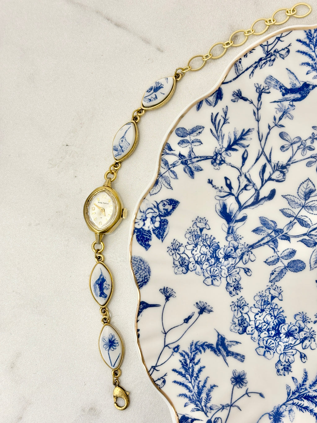 Antique Waltham manual watch with blue hummingbirds