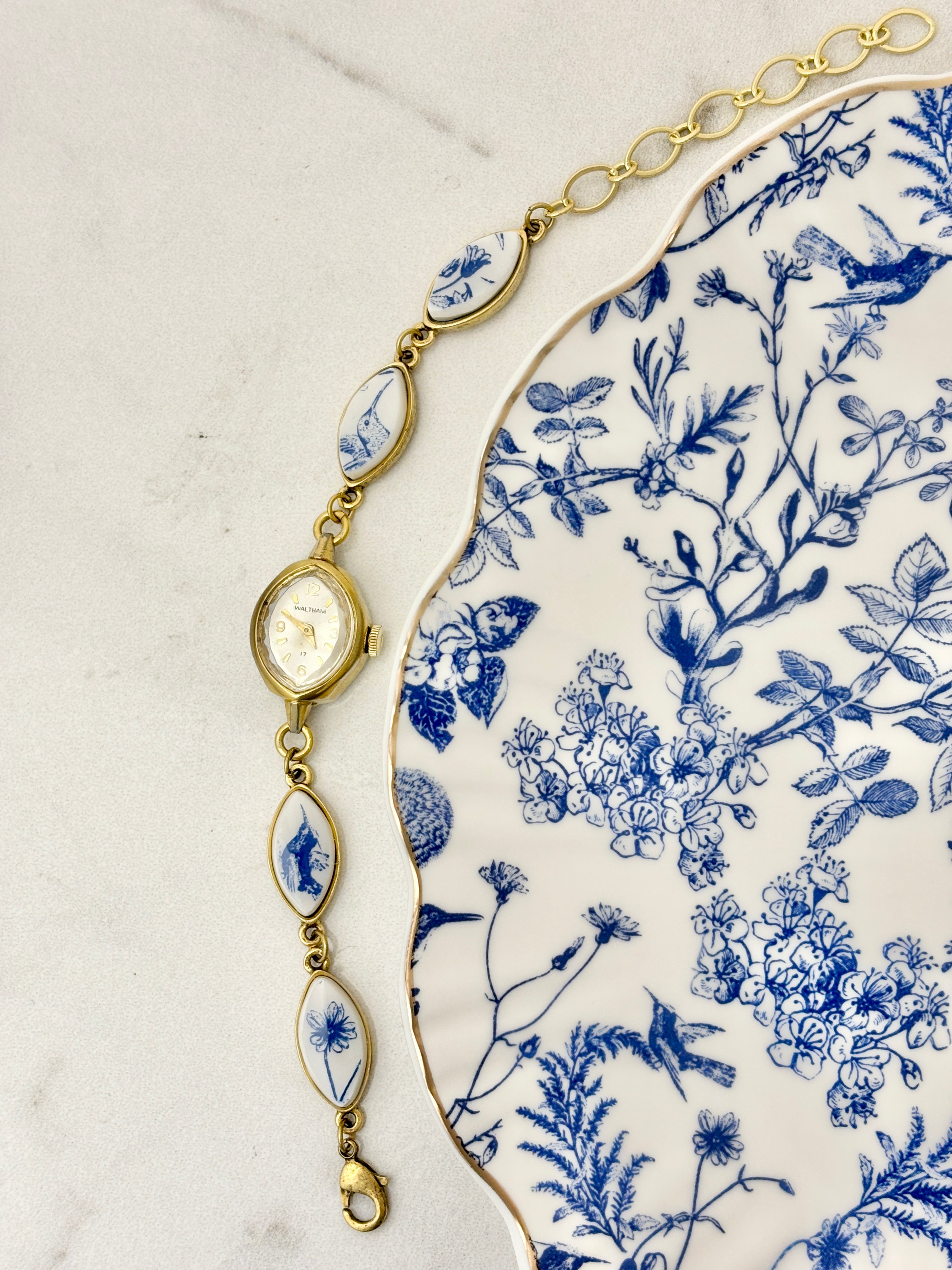 Antique Waltham manual watch with blue hummingbirds